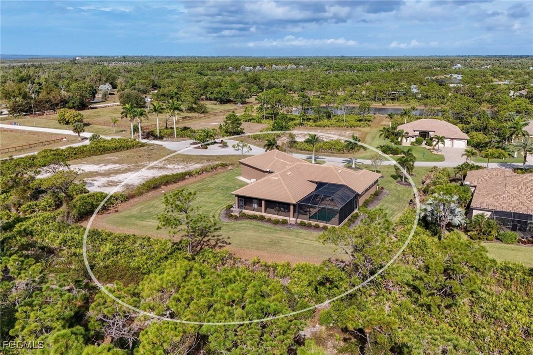 6142 Calusa Rdg Trail Bokeelia, FL 33922 - Photo 37 of 43 an aerial view of residential houses with outdoor space
