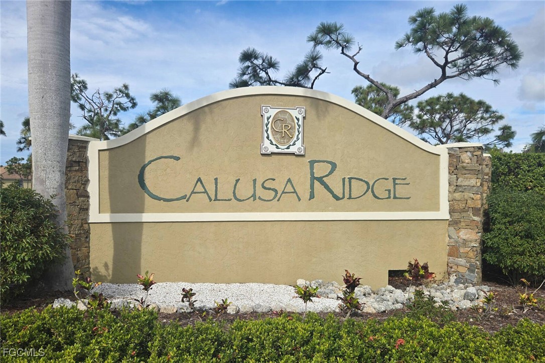 6142 Calusa Rdg Trail Bokeelia, FL 33922 - Photo 42 of 43 a sign that is on the side of the wall