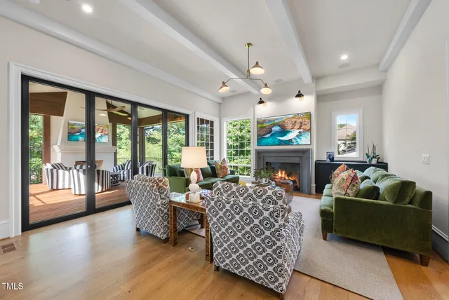 a bathroom with a double vanity sink toilet and shower