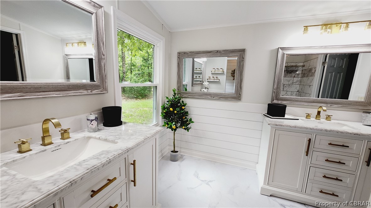 8065 Filly Run Road Gloucester, VA 23061 - Photo 16 of 33 Bathroom featuring crown molding, tile flooring, and vanity
