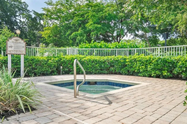 a view of a backyard with plants