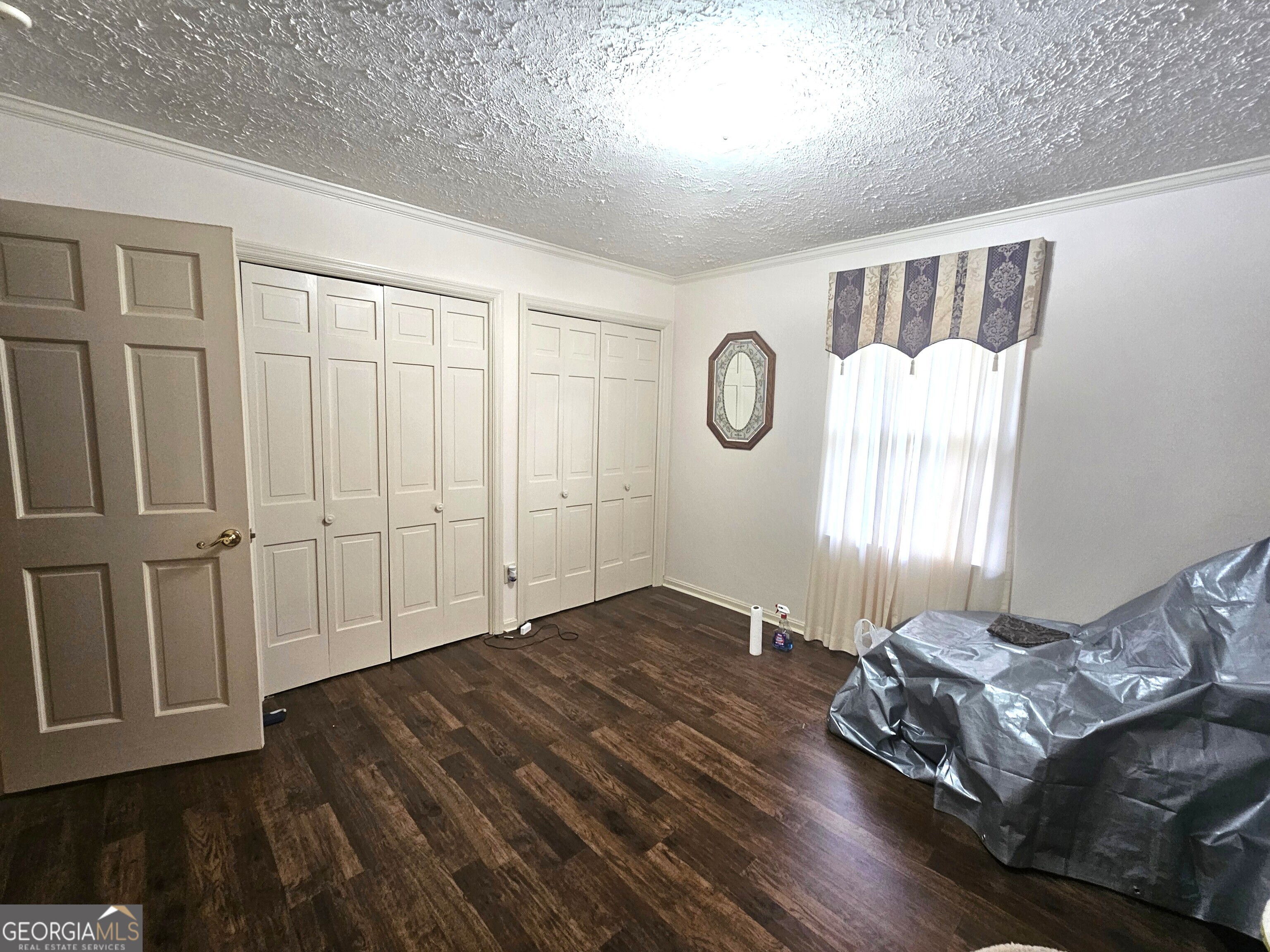 613 Old Macon Road Dublin, GA 31021 - Photo 12 of 17 a view of a livingroom with wooden floor