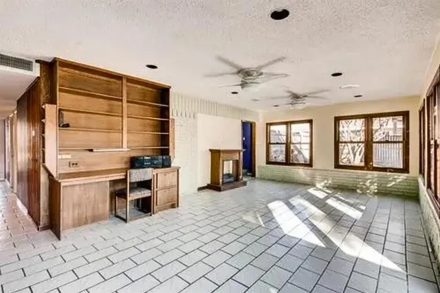 a view of kitchen with furniture and window