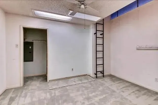 a balcony with wooden fence