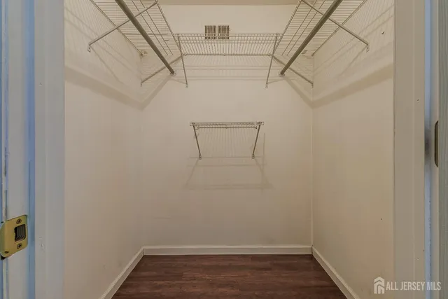 a view of a room with racks on the wall