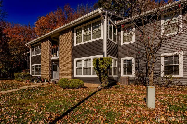 a front view of a house with yard