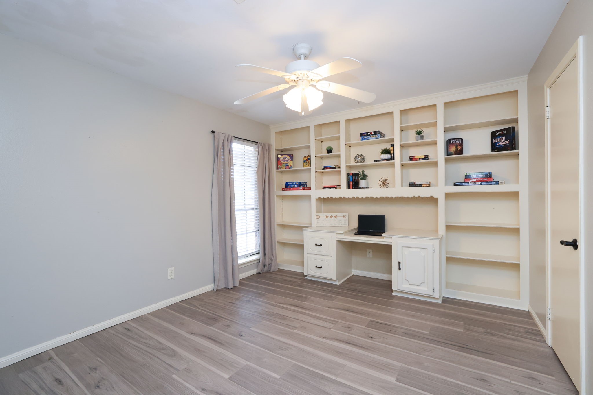 22010 Buescher Road Tomball, TX 77377 - Photo 18 of 30 a view of a room with cabinet and window