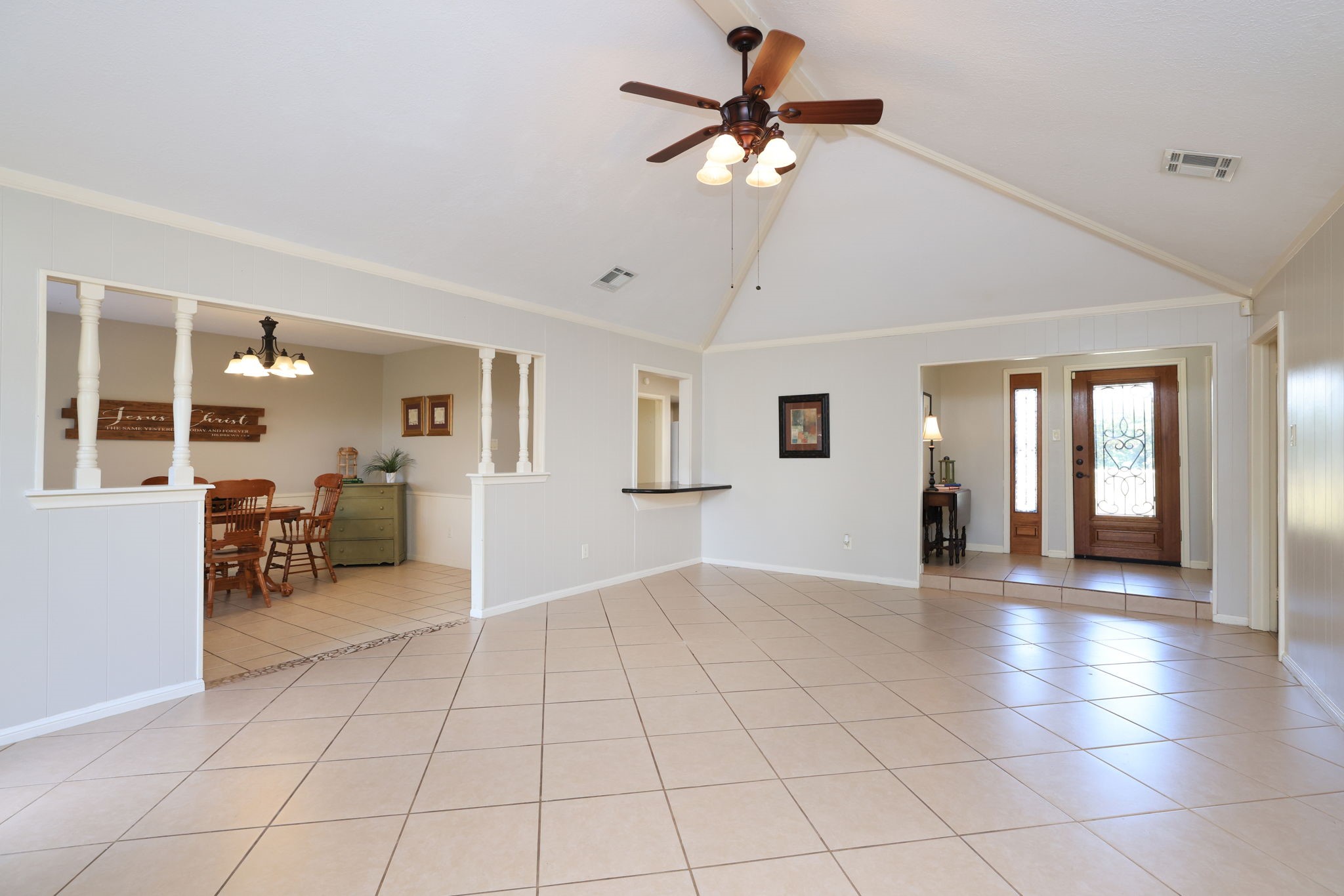 22010 Buescher Road Tomball, TX 77377 - Photo 6 of 30 a view of livingroom with hardwood floor and a ceiling fan