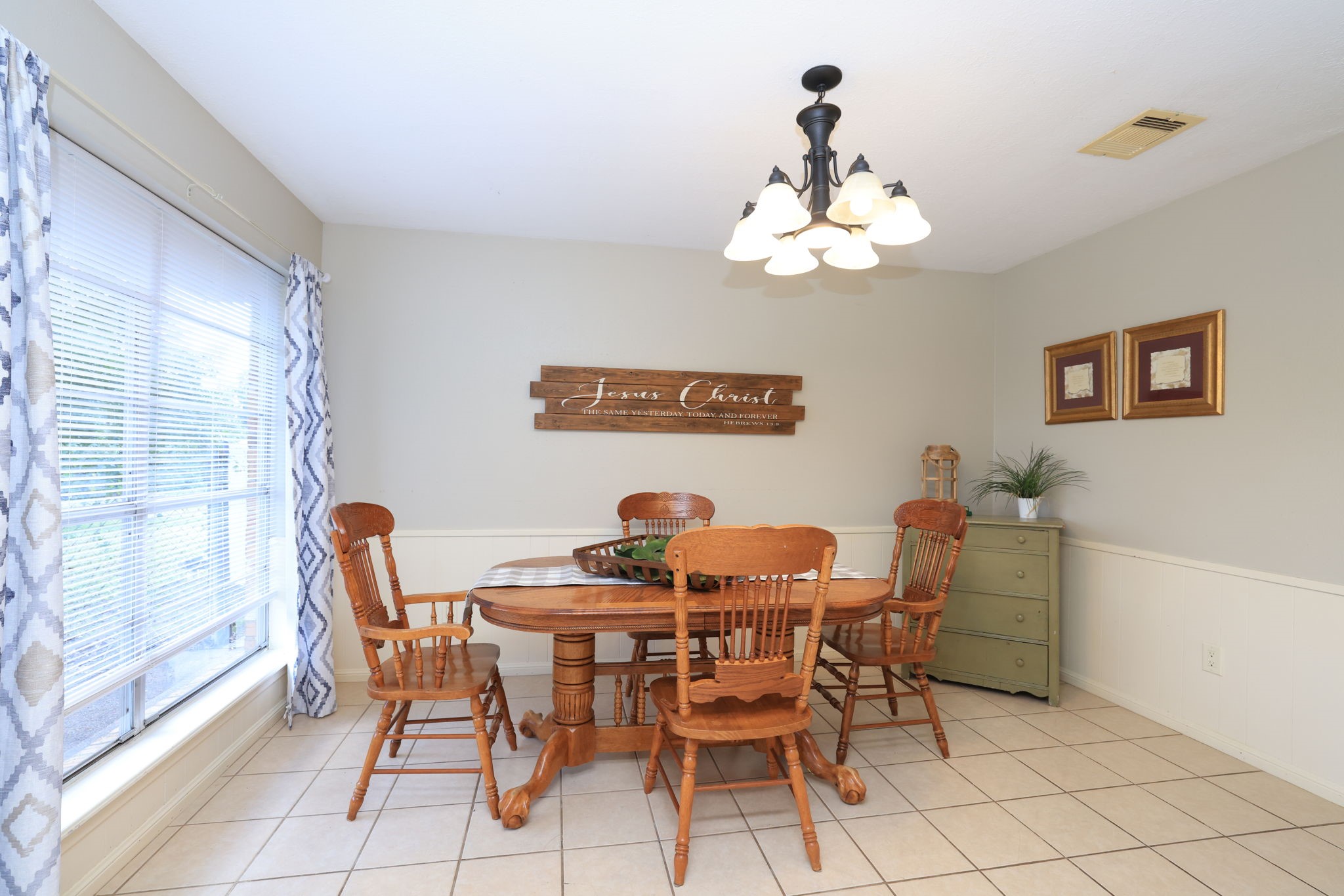 22010 Buescher Road Tomball, TX 77377 - Photo 7 of 30 a dining room with furniture and chandelier
