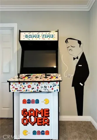 a living room with a stove and a microwave oven