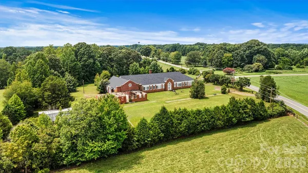 a view of a lake with a yard