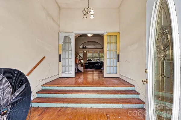 a view of a hallway with a couch