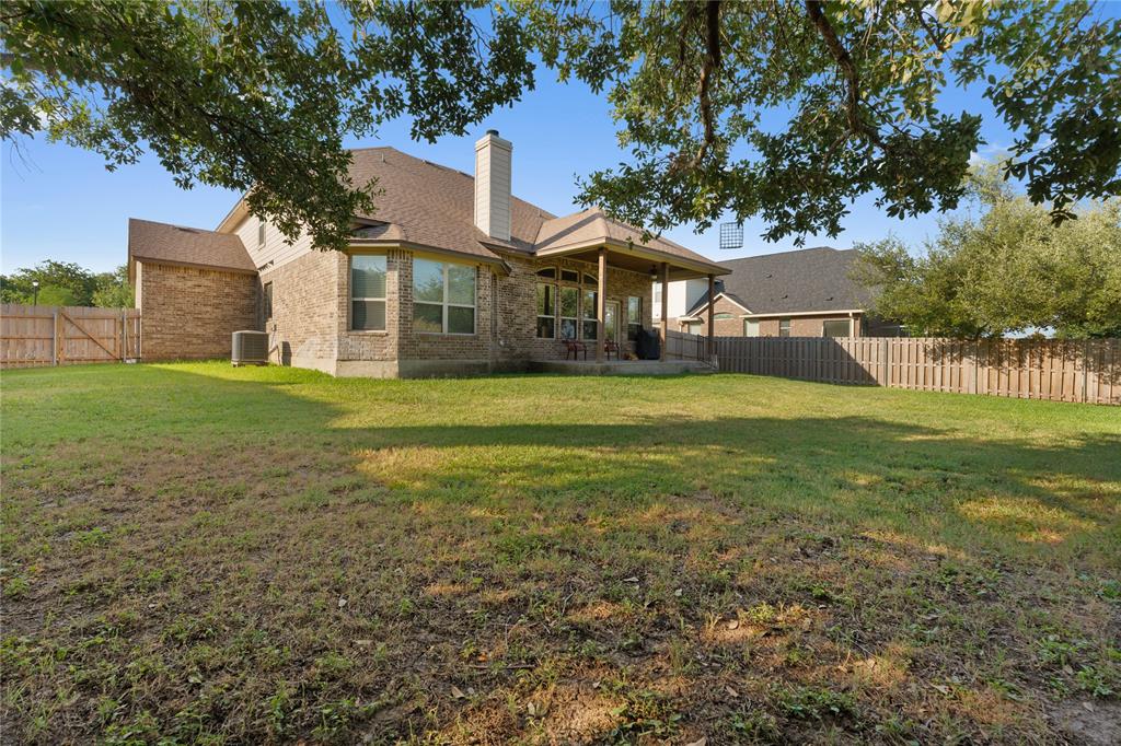 5533 Wisdom Court Waco, TX 76708 - Photo 21 of 21 a view of a big yard next to a house with a big yard