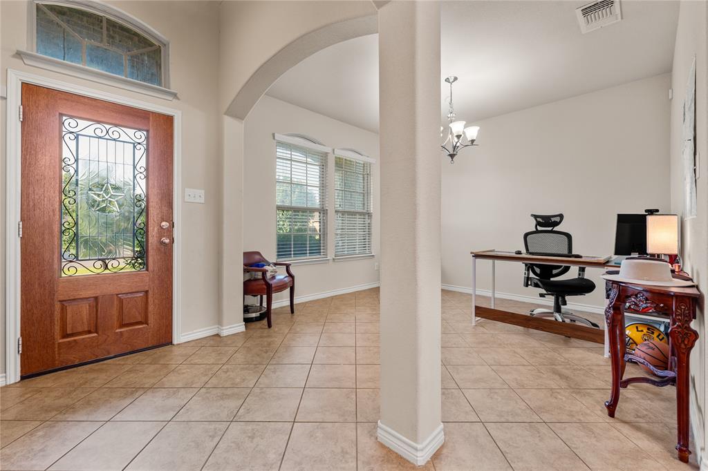 5533 Wisdom Court Waco, TX 76708 - Photo 6 of 21 a view of a livingroom with workspace and a window