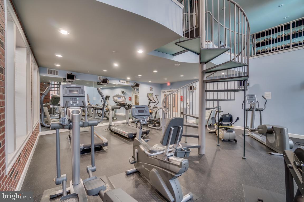 7 Granite Place, Unit 215 Gaithersburg, MD 20878 - Photo 11 of 36 a view of a room with gym equipment