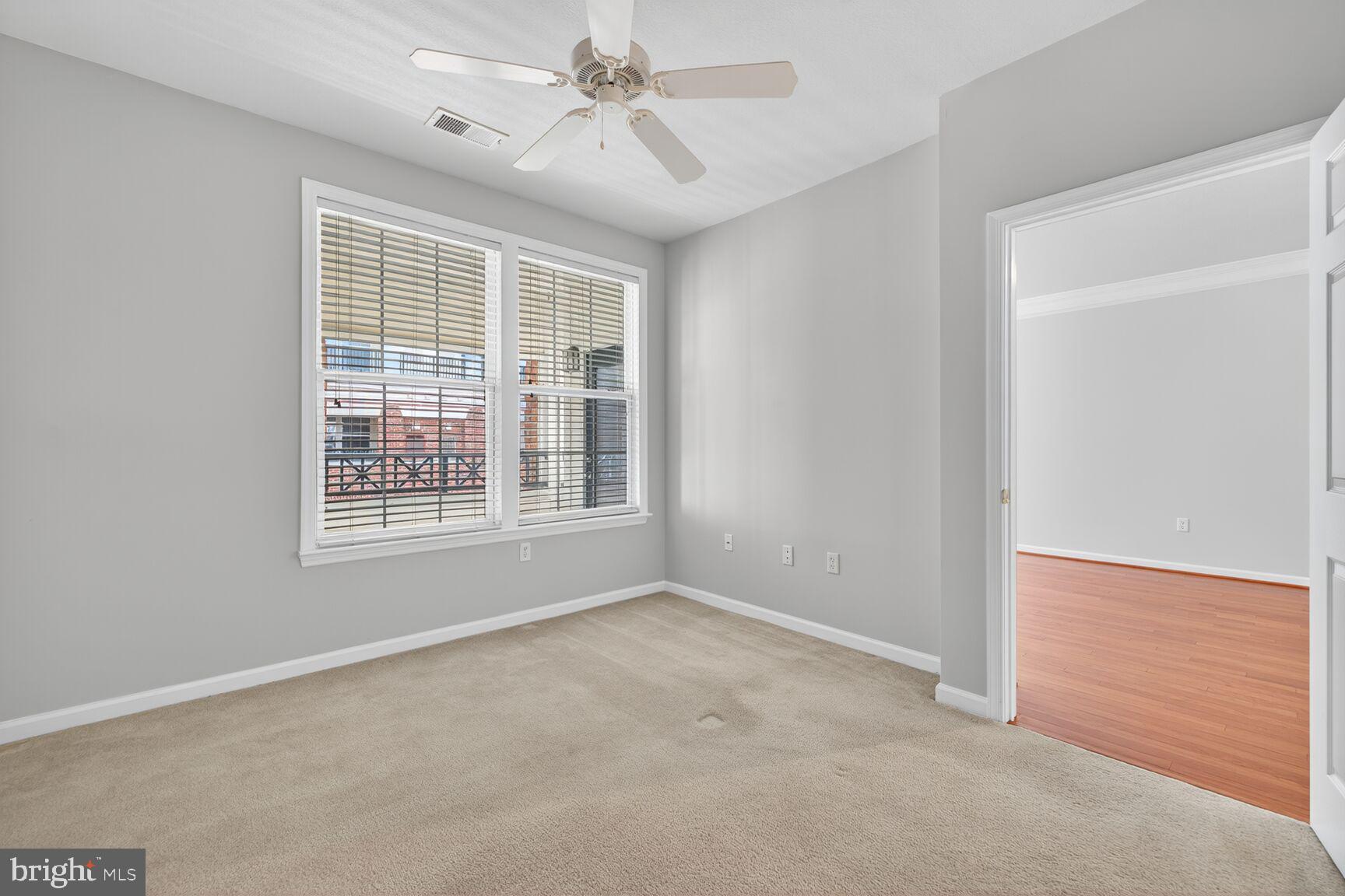 7 Granite Place, Unit 215 Gaithersburg, MD 20878 - Photo 22 of 36 a view of an empty room with a window