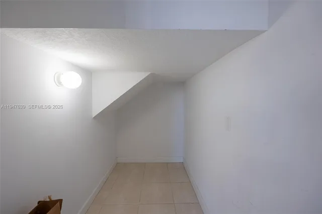 a view of small space with racks on the wall