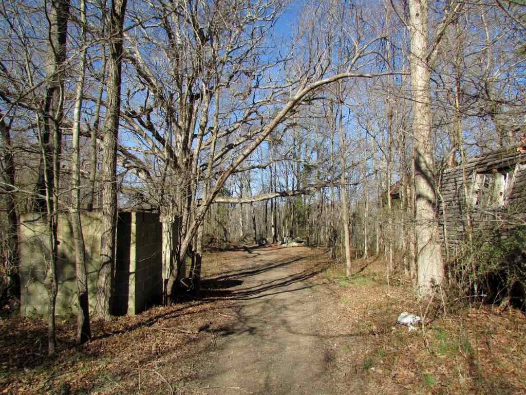 Allie Clay Road Roxboro, NC 27573 - Photo 6 of 23 As you follow the trail you will come up on the OLD HOMESTEAD site. On the left is the old well house. Please be careful as old hand dug well is there. Trail