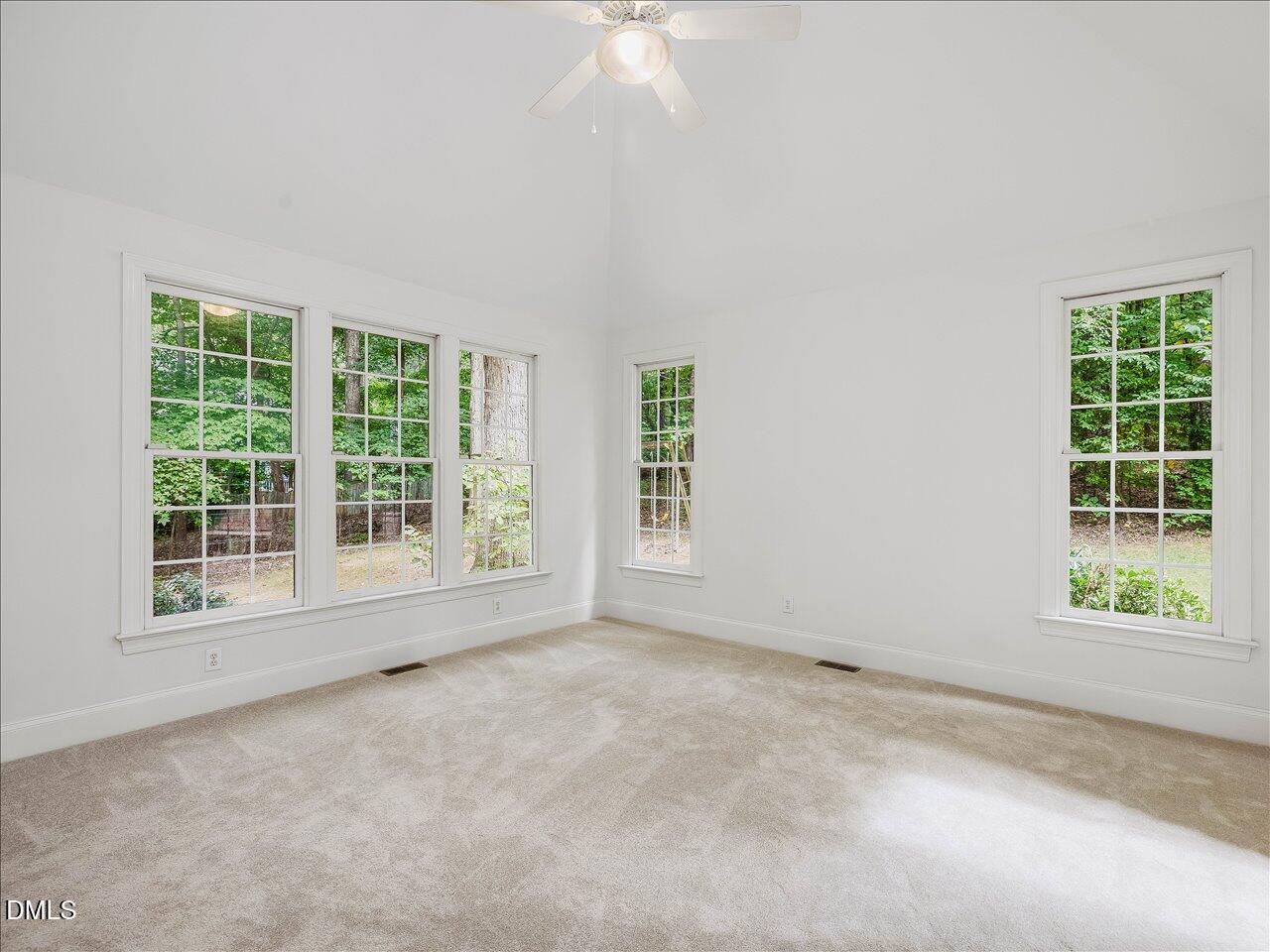 2721 Glassman Lane Raleigh, NC 27606 - Photo 11 of 26 an empty room with a window