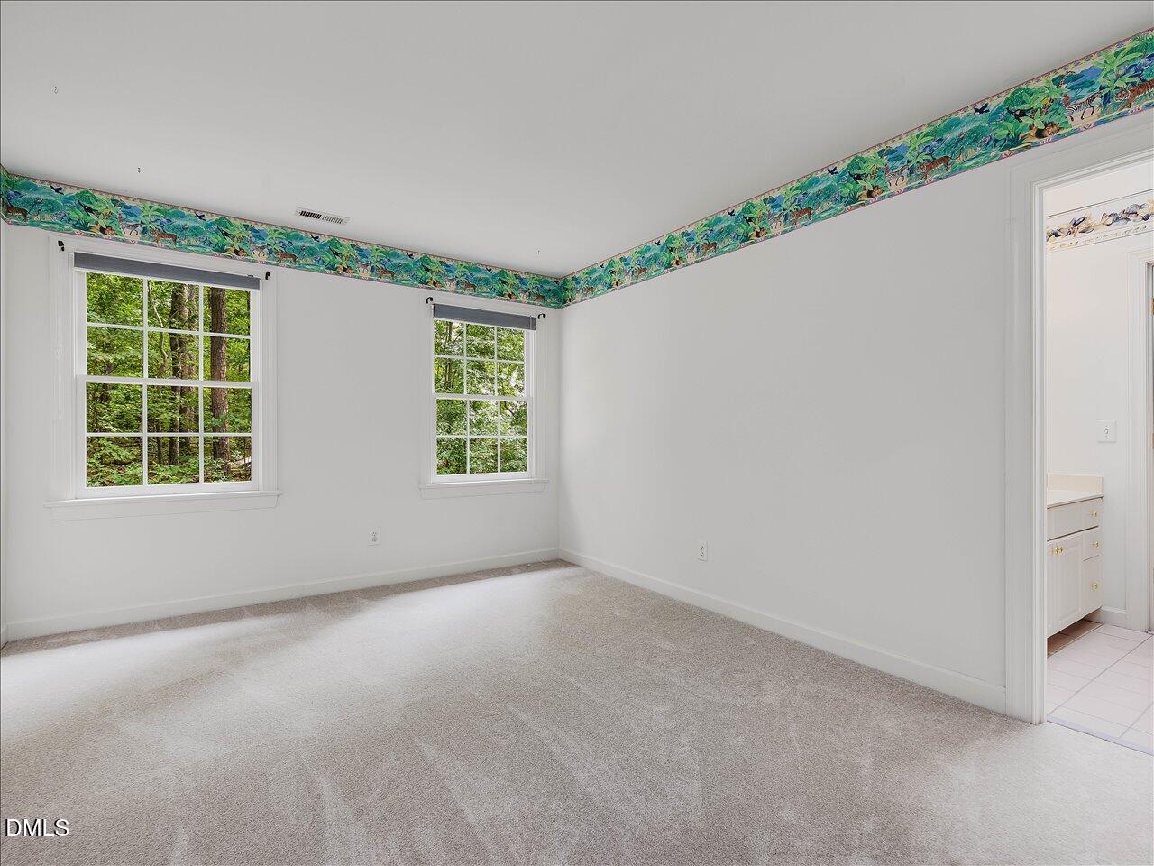 2721 Glassman Lane Raleigh, NC 27606 - Photo 23 of 26 a view of an empty room with a window