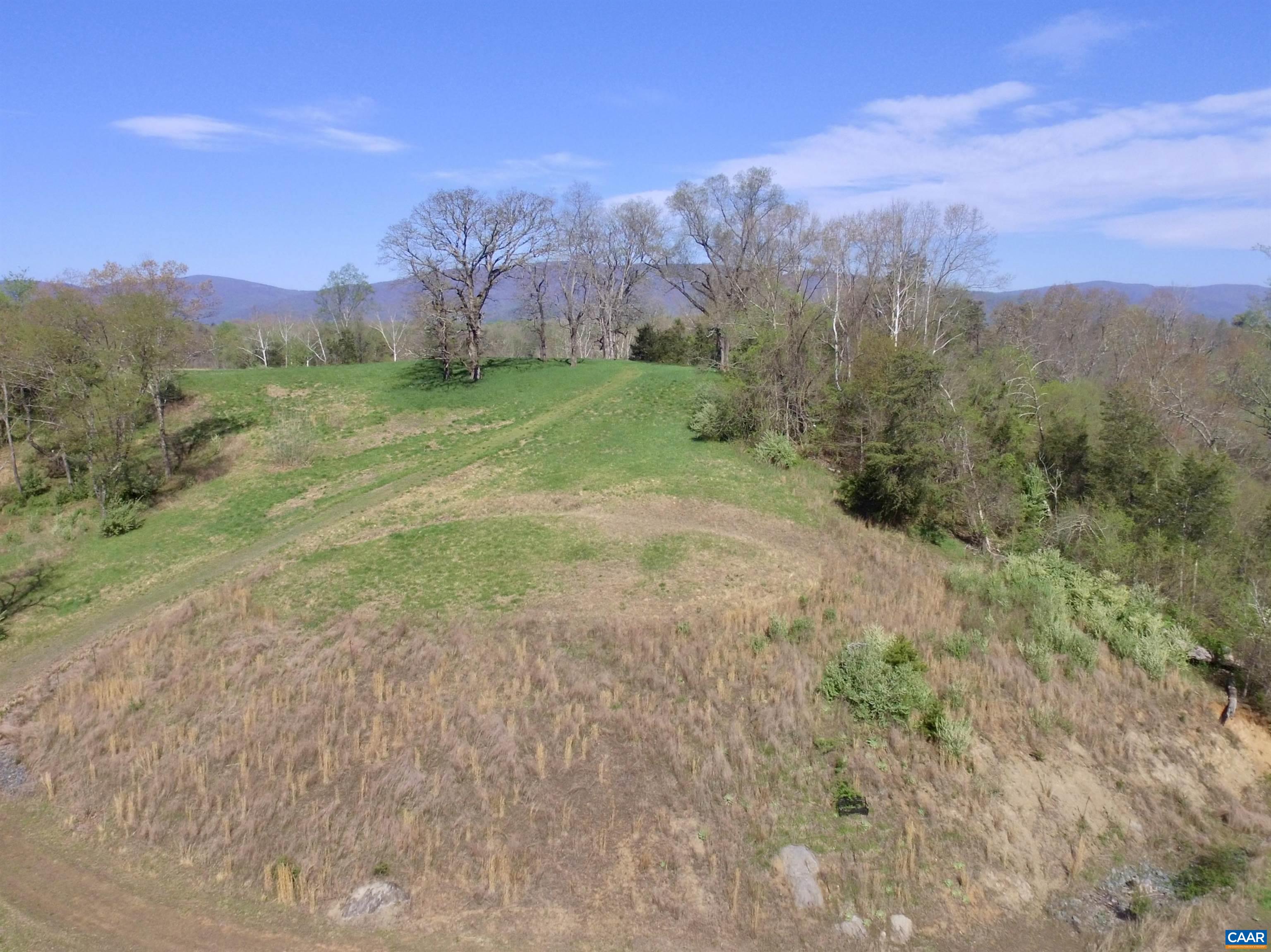 Gillums Ridge Road Charlottesville, VA 22903 - Photo 3 of 29 a view of a field with mountains in the background