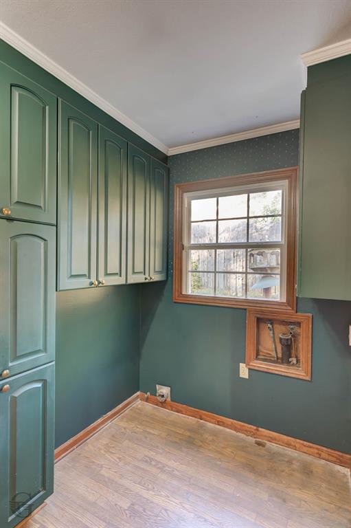 1306 East Todd Street Minden, LA 71055 - Photo 16 of 27 an empty room with a window and cabinet