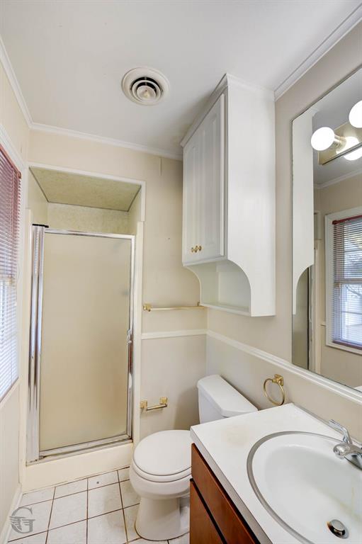 1306 East Todd Street Minden, LA 71055 - Photo 21 of 27 a bathroom with a sink toilet and shower