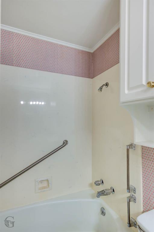 1306 East Todd Street Minden, LA 71055 - Photo 27 of 27 a bathroom with a bathtub and a shower