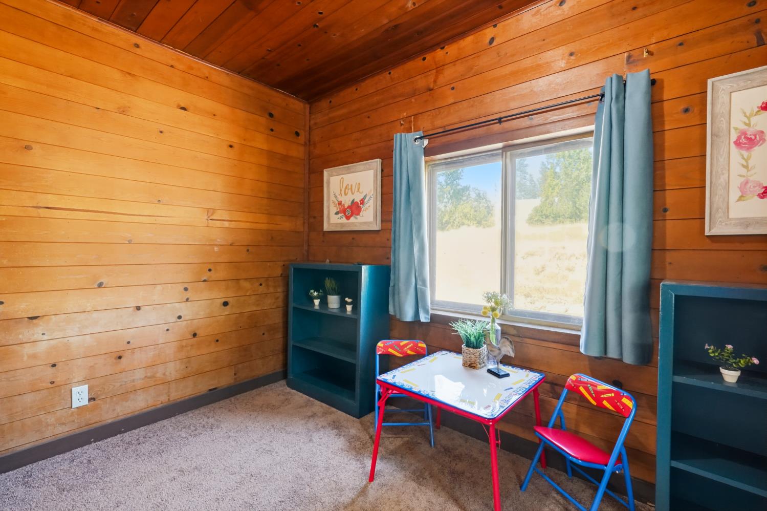 13351 Newtown Road Nevada City, CA 95959 - Photo 42 of 50 a room with furniture and a fireplace