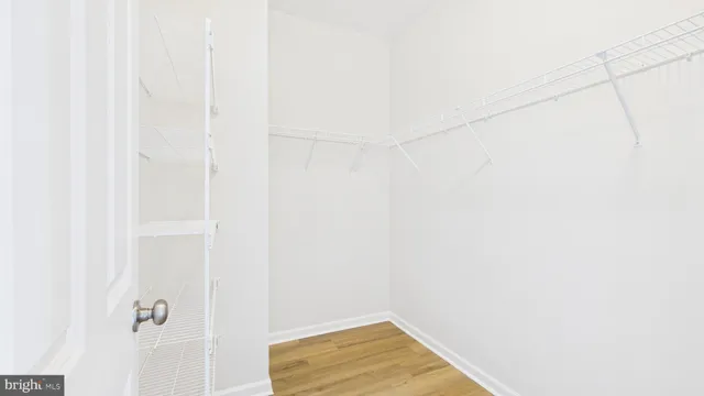 a close view of a utility room with dryer and washer