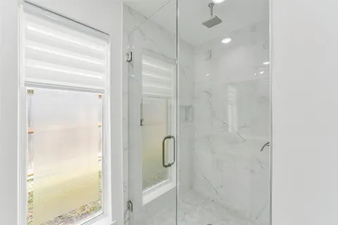 a view of livingroom with furniture and a window