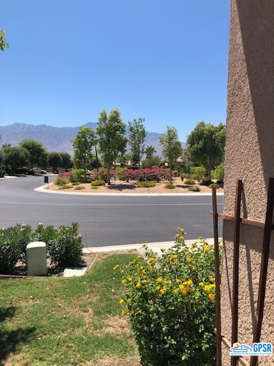 40 Shoreline Drive Rancho Mirage, CA 92270 - Photo 17 of 22 a view of a lake with a building in the background