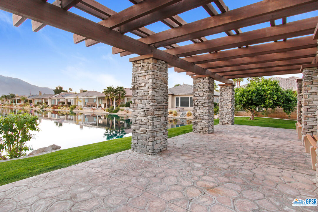 40 Shoreline Drive Rancho Mirage, CA 92270 - Photo 19 of 22 a view of a porch with a garden