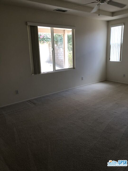 40 Shoreline Drive Rancho Mirage, CA 92270 - Photo 22 of 22 an empty room with a window