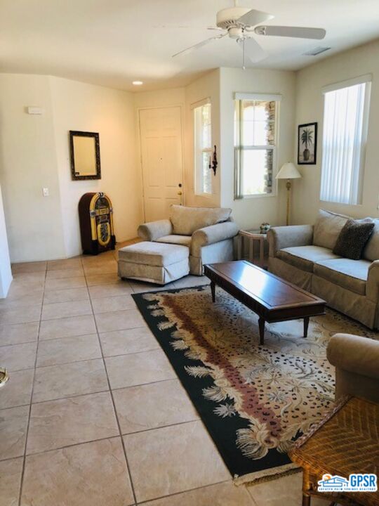 40 Shoreline Drive Rancho Mirage, CA 92270 - Photo 7 of 22 a living room with furniture and a rug