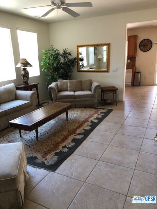 40 Shoreline Drive Rancho Mirage, CA 92270 - Photo 8 of 22 a living room with furniture and a flat screen tv