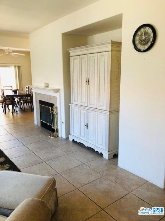 40 Shoreline Drive Rancho Mirage, CA 92270 - Photo 9 of 22 a view of livingroom with furniture and a fireplace