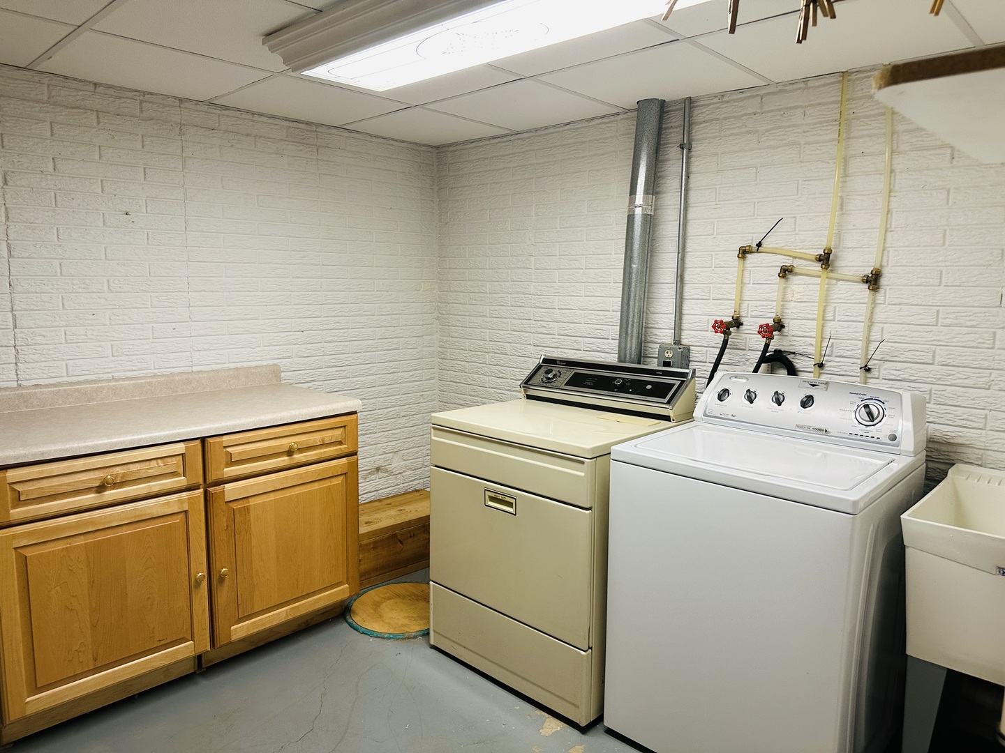219 Palm Drive Lena, IL 61048 - Photo 45 of 50 a utility room with dryer and washer