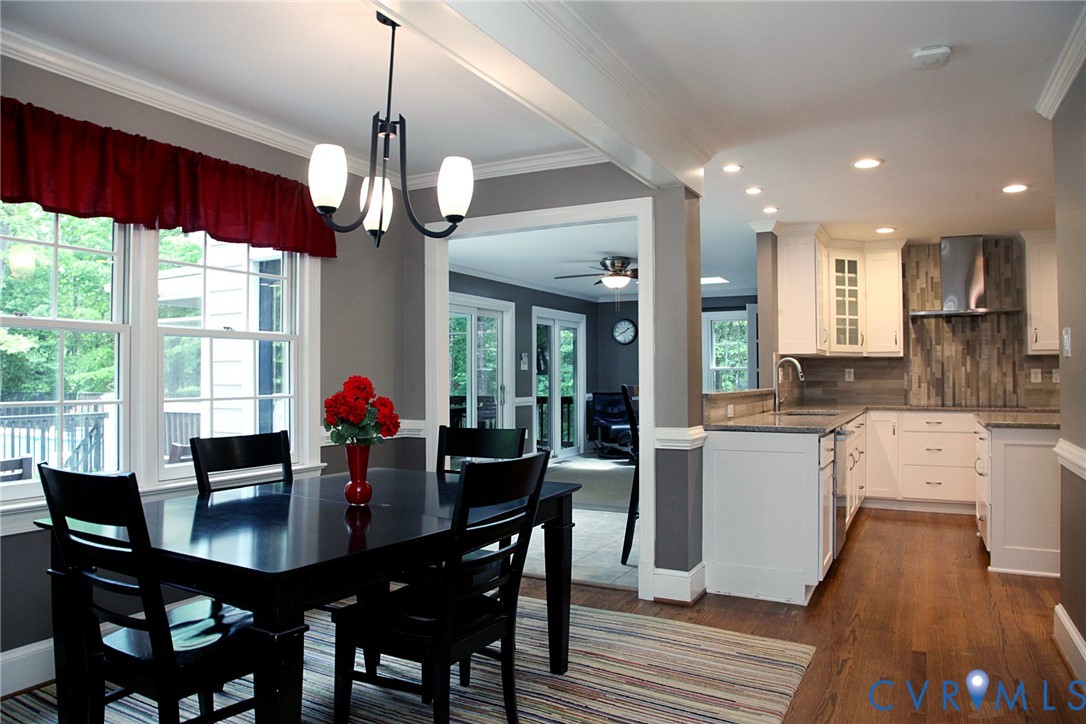231 Hazelmere Drive Chesterfield, VA 23236 - Photo 5 of 33 a view of a dining room with furniture window and wooden floor