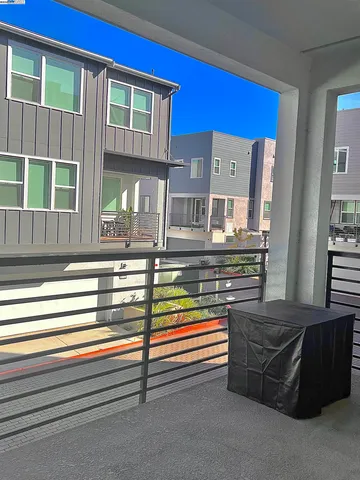 a living room with furniture and windows