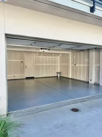 an empty room with wooden floor