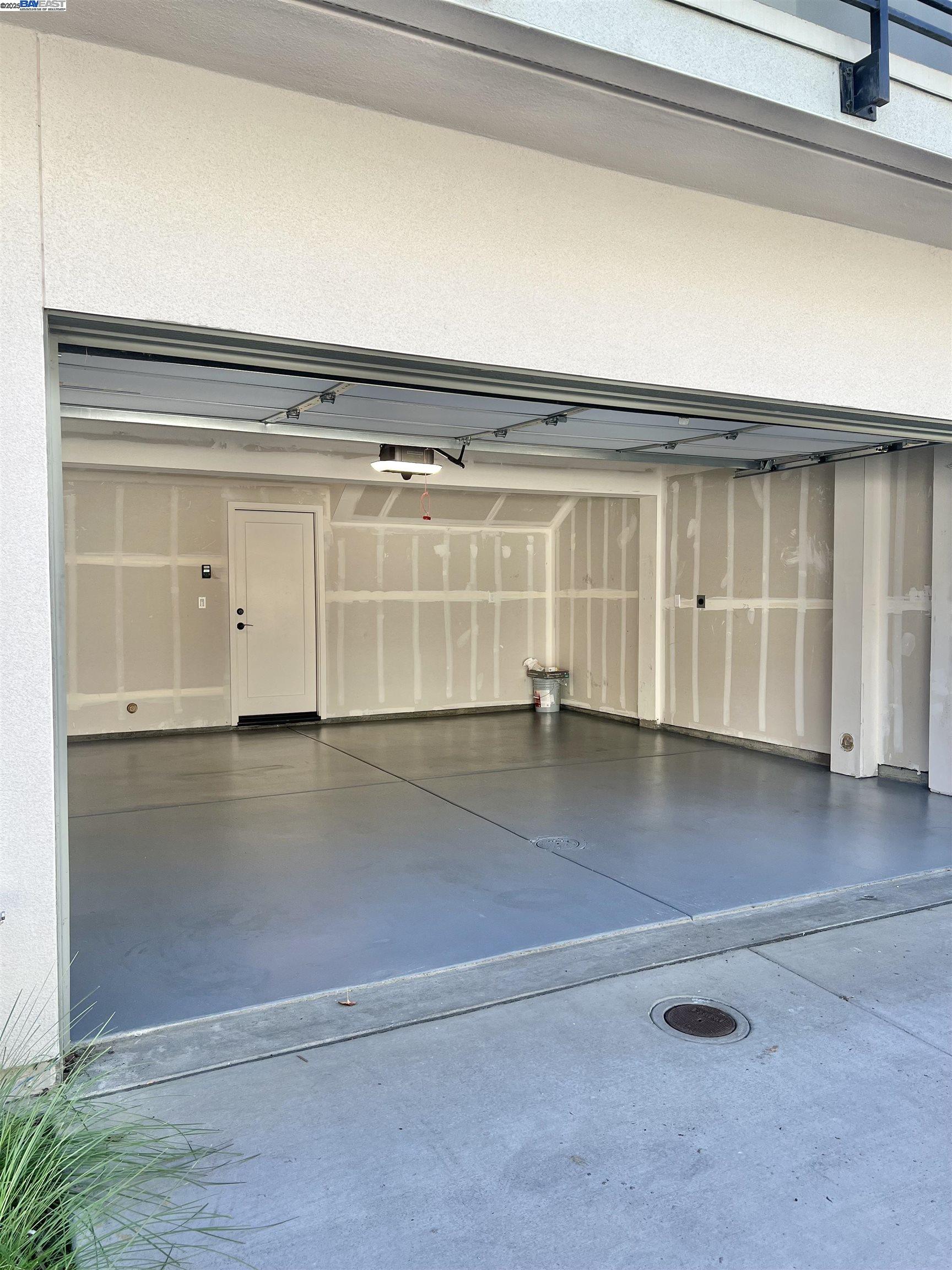 1712 17th Street Oakland, CA 94607 - Photo 4 of 31 an empty room with wooden floor