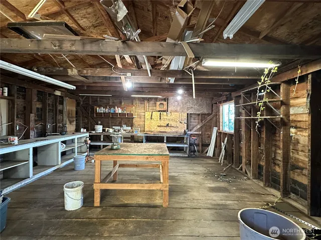 a view of a yard with a tree