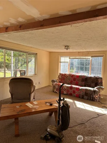 a room with furniture and a window