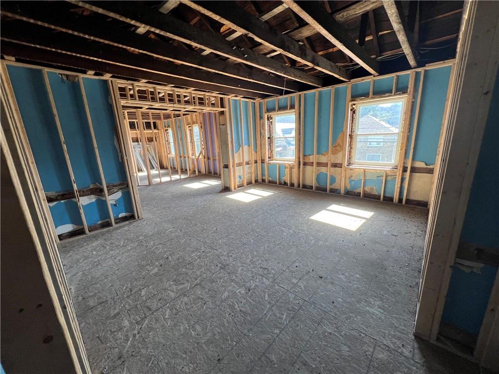 1250 Midland Beaver Road Industry, PA 15052 - Photo 19 of 40 a view of an empty room with a fireplace