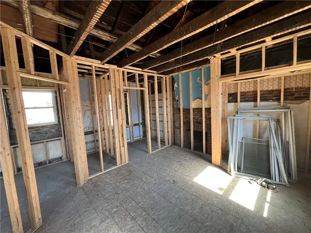 a view of hallway with windows