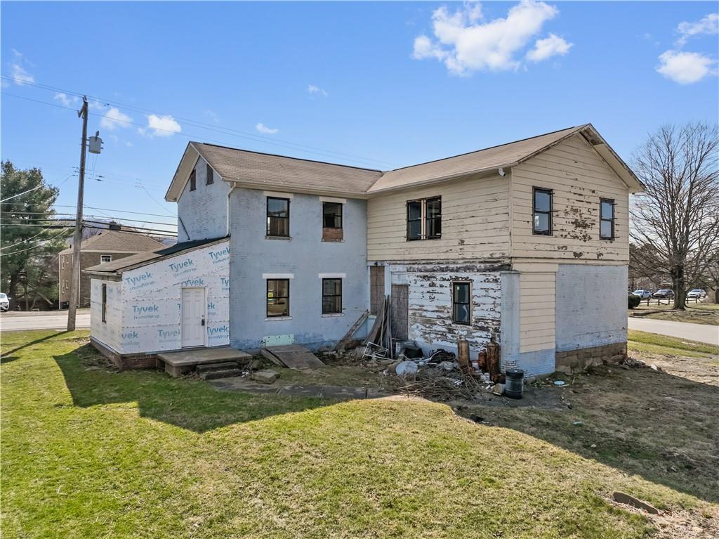 1250 Midland Beaver Road Industry, PA 15052 - Photo 29 of 40 a front view of a house with a yard