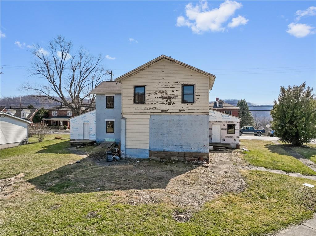 1250 Midland Beaver Road Industry, PA 15052 - Photo 31 of 40 a view of a house with a yard