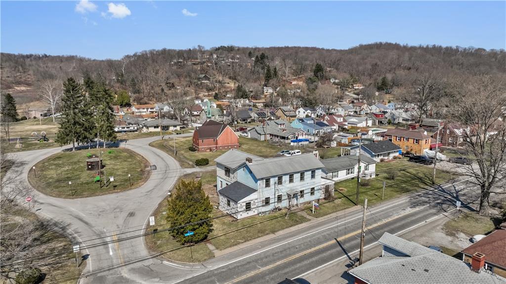 1250 Midland Beaver Road Industry, PA 15052 - Photo 4 of 40 an aerial view of a house with mountain view
