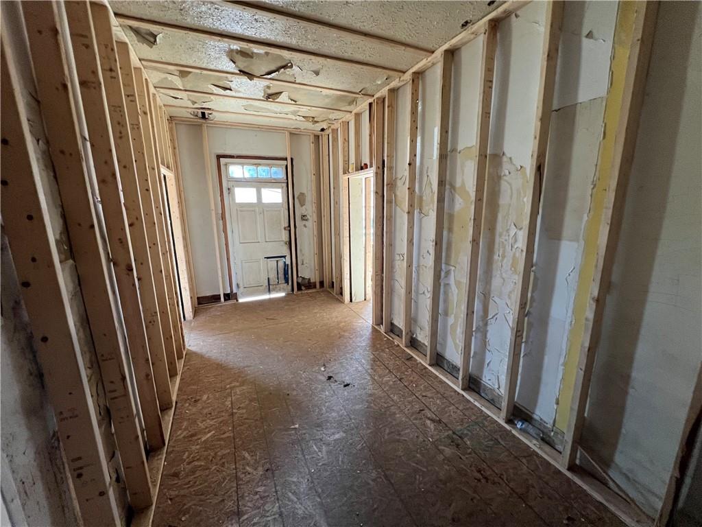 1250 Midland Beaver Road Industry, PA 15052 - Photo 9 of 40 a view of a hallway with wooden shelves